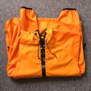 Orange windbreaker size medium